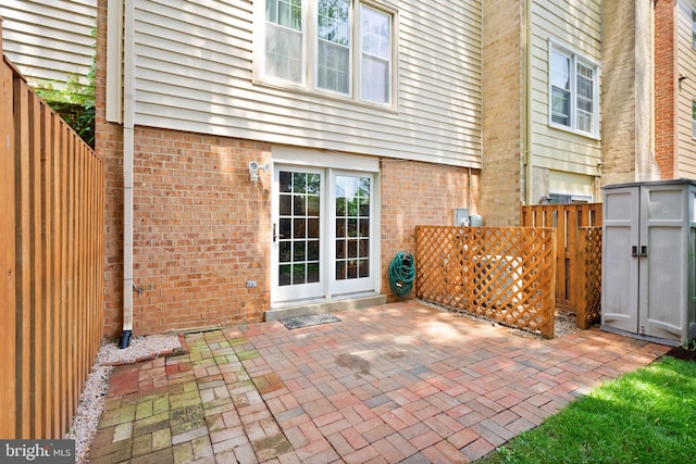 9882 High Water Ct, Burke, VA 22015 - fenced backyard with a patio and a gate