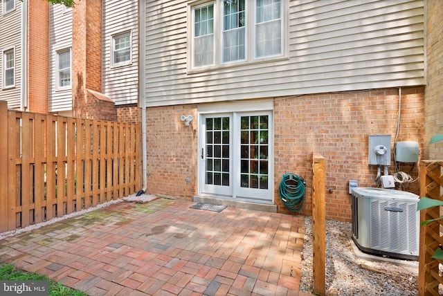 9882 High Water Ct, Burke, VA 22015 - view of patio featuring central AC unit