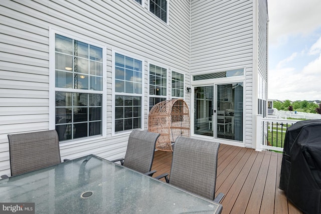1303 Officers Row, Delaware City, DE 19706 - wooden deck featuring outdoor dining area and a grill