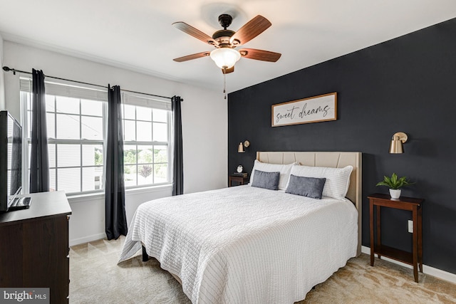 1303 Officers Row, Delaware City, DE 19706 - bedroom featuring light colored carpet, baseboards, and a ceiling fan
