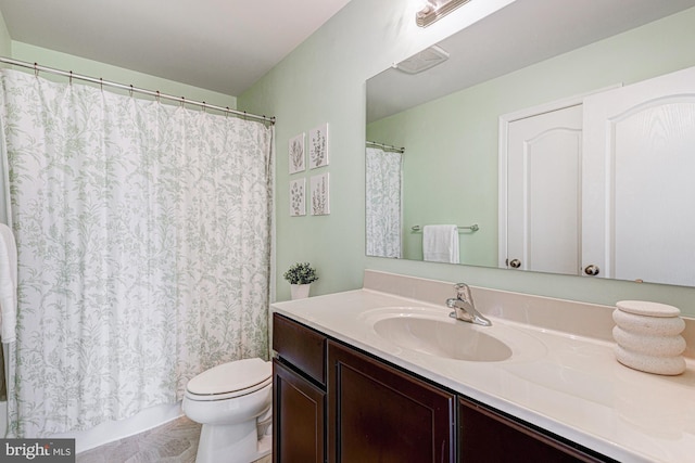1303 Officers Row, Delaware City, DE 19706 - bathroom featuring vanity, toilet, and a shower with shower curtain