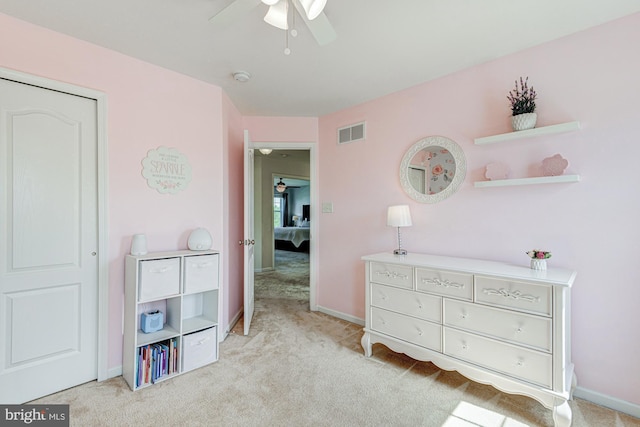 1303 Officers Row, Delaware City, DE 19706 - bedroom featuring light colored carpet, baseboards, and a ceiling fan