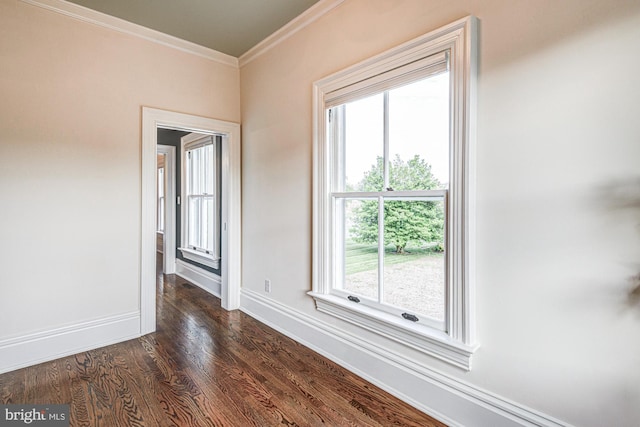 1303 Officers Row, Delaware City, DE 19706 - unfurnished room featuring crown molding, dark wood-style flooring, and baseboards