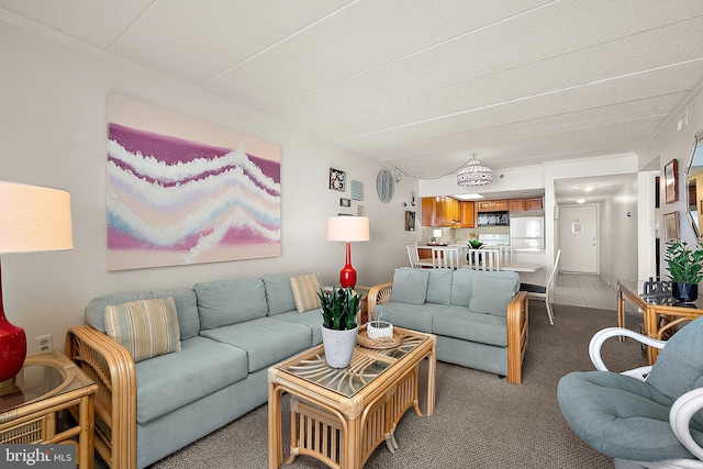 10002 Coastal Hwy Unit 611, Ocean City, MD 21842 - carpeted living room featuring ornamental molding