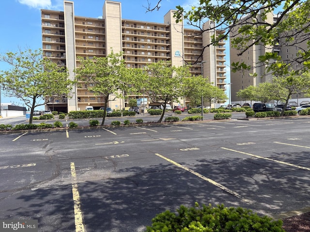 10002 Coastal Hwy Unit 611, Ocean City, MD 21842 - view of apartment building / complex with uncovered parking