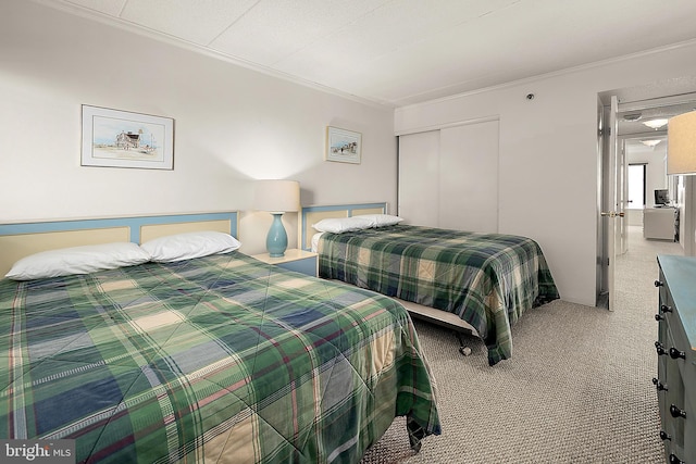 10002 Coastal Hwy Unit 611, Ocean City, MD 21842 - carpeted bedroom with crown molding and a closet
