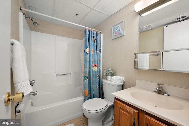 10002 Coastal Hwy Unit 611, Ocean City, MD 21842 - bathroom featuring tile patterned flooring, toilet, shower / bath combo with shower curtain, a paneled ceiling, and vanity