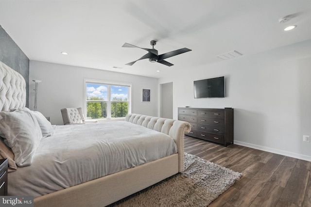 bedroom with dark wood finished floors, ceiling fan, recessed lighting, and baseboards