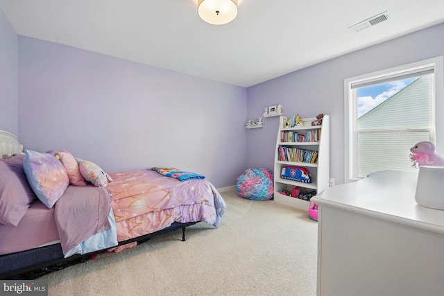 bedroom featuring carpet