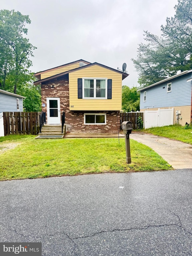 552 Elizabeth Ln, Glen Burnie, MD 21061 - split level home featuring brick siding