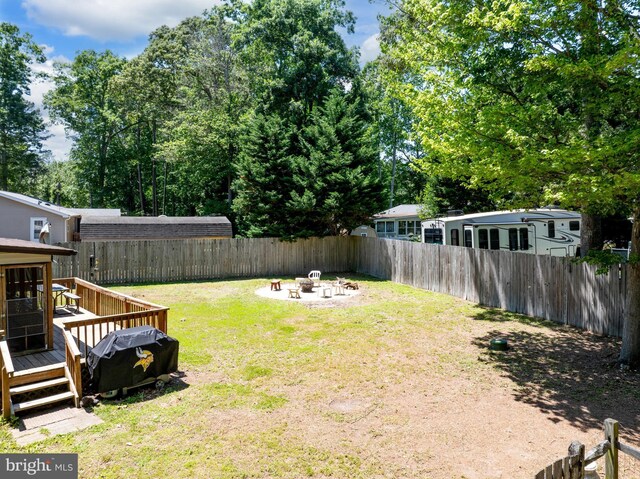 27846 Lord Calvert Dr, Millsboro, DE 19966 - view of yard with an outdoor fire pit and a deck