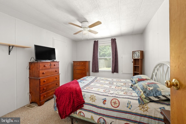 27846 Lord Calvert Dr, Millsboro, DE 19966 - carpeted bedroom with a ceiling fan and a textured ceiling