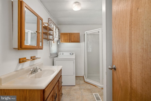 27846 Lord Calvert Dr, Millsboro, DE 19966 - full bathroom featuring washer / clothes dryer, a shower stall, and vanity