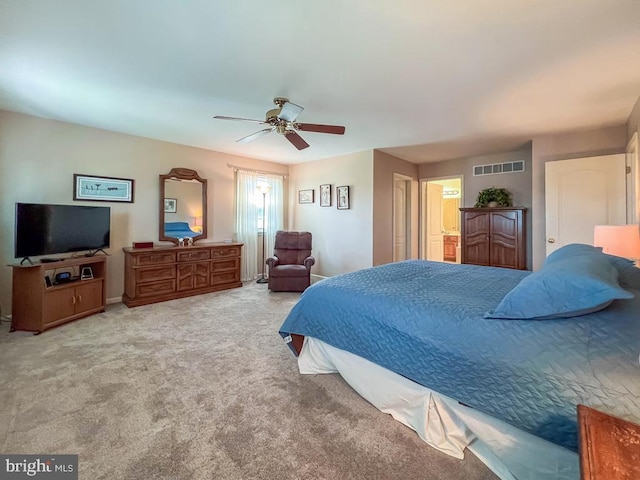 carpeted bedroom with a ceiling fan