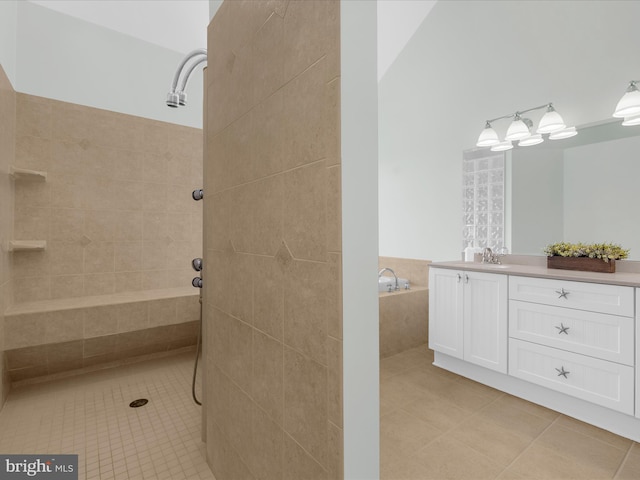 7839 Denton Ave, Baltimore, MD 21219 - full bath featuring tile patterned flooring, vanity, walk in shower, and a garden tub