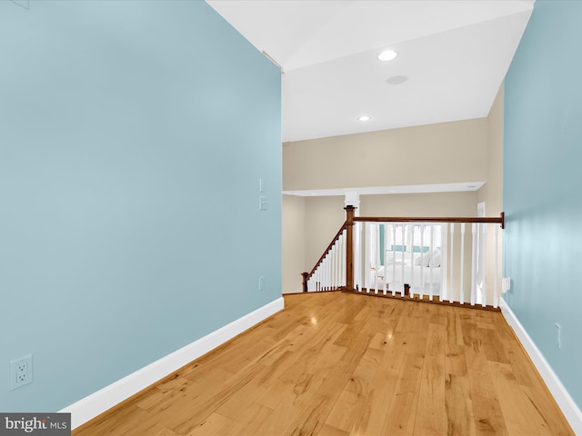 7839 Denton Ave, Baltimore, MD 21219 - corridor with light wood-style floors, baseboards, an upstairs landing, and recessed lighting