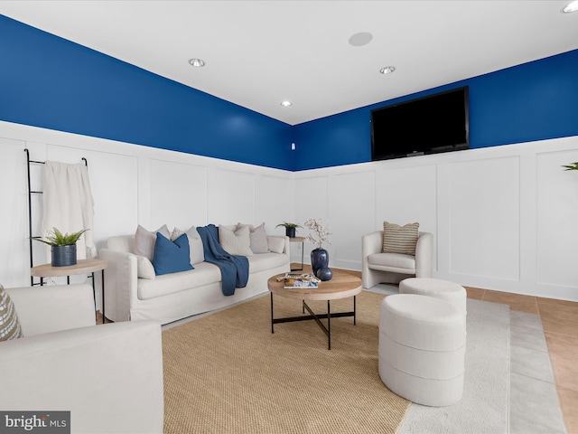 7839 Denton Ave, Baltimore, MD 21219 - living area with a decorative wall, a wainscoted wall, tile patterned flooring, and recessed lighting