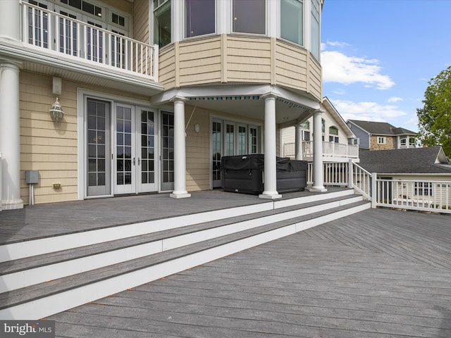 7839 Denton Ave, Baltimore, MD 21219 - wooden deck with a hot tub and french doors