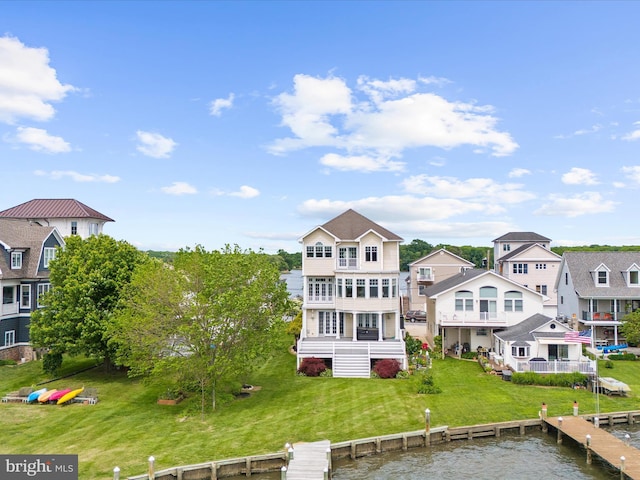 7839 Denton Ave, Baltimore, MD 21219 - rear view of house featuring a water view and a lawn