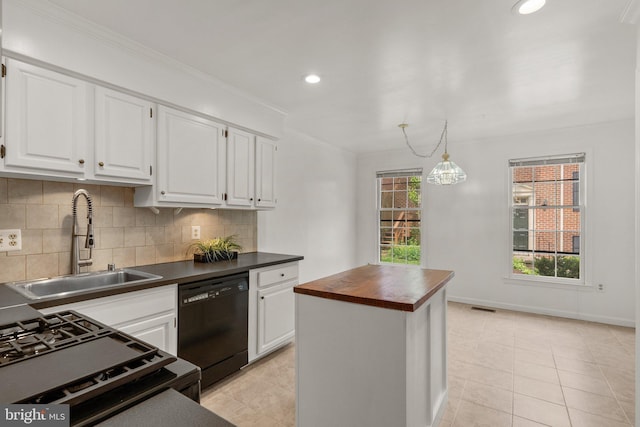 4849 Carriagepark Rd, Fairfax, VA 22032 - kitchen featuring dishwasher, a sink, ornamental molding, backsplash, and light tile patterned flooring