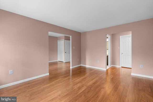 4849 Carriagepark Rd, Fairfax, VA 22032 - unfurnished room with baseboards and light wood-style floors