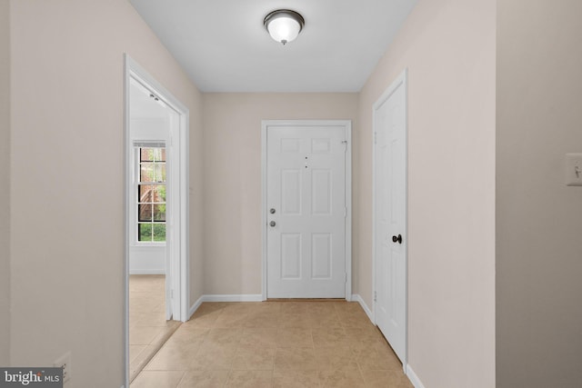 4849 Carriagepark Rd, Fairfax, VA 22032 - hallway featuring light tile patterned floors and baseboards