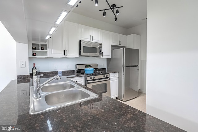 4415 Weatherington Ln Unit 401, Fairfax, VA 22030 - kitchen featuring stainless steel appliances, a sink, white cabinetry, open shelves, and dark stone counters