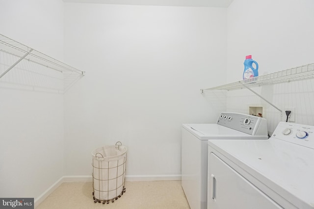4415 Weatherington Ln Unit 401, Fairfax, VA 22030 - washroom with separate washer and dryer and baseboards