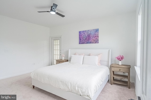 4415 Weatherington Ln Unit 401, Fairfax, VA 22030 - bedroom with light carpet, baseboards, and a ceiling fan