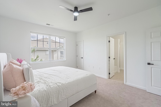 4415 Weatherington Ln Unit 401, Fairfax, VA 22030 - bedroom with light colored carpet, baseboards, and a ceiling fan