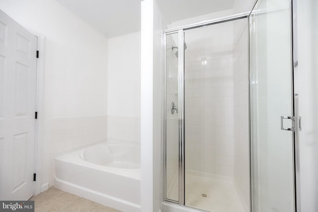 4415 Weatherington Ln Unit 401, Fairfax, VA 22030 - bathroom featuring a garden tub, a shower stall, and tile patterned floors