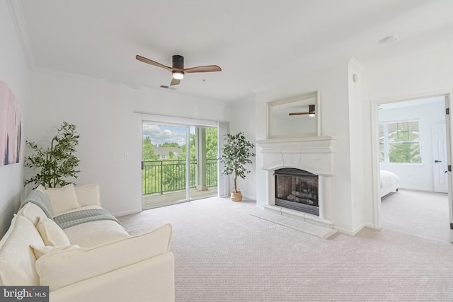 4415 Weatherington Ln Unit 401, Fairfax, VA 22030 - living room featuring ceiling fan, carpet flooring, baseboards, a fireplace with raised hearth, and ornamental molding