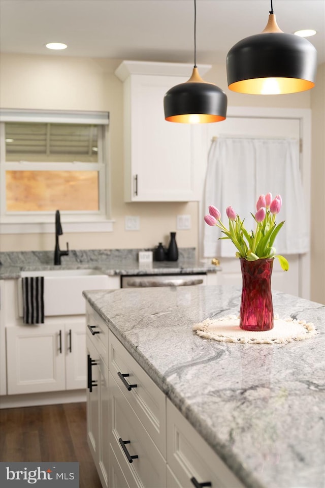 203 Coville Dr, Browns Mills, NJ 08015 - kitchen with a sink, hanging light fixtures, white cabinets, light stone counters, and recessed lighting