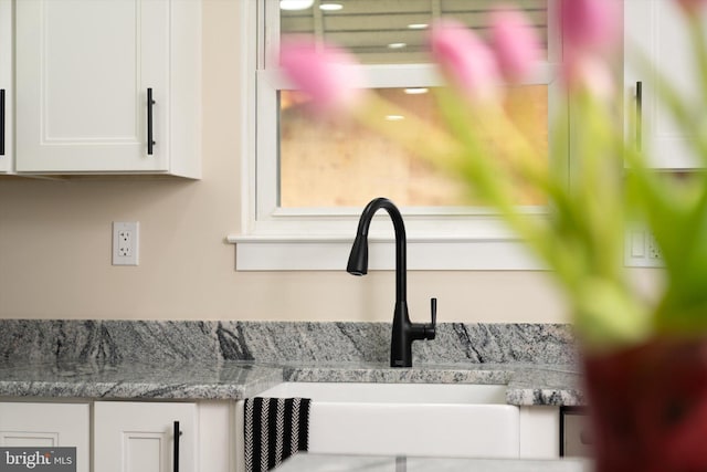203 Coville Dr, Browns Mills, NJ 08015 - detailed view of a sink, white cabinetry, and light countertops