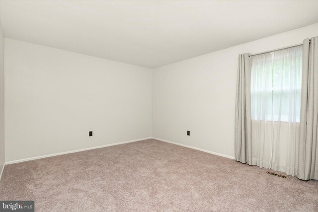 203 Coville Dr, Browns Mills, NJ 08015 - unfurnished room with light colored carpet and baseboards