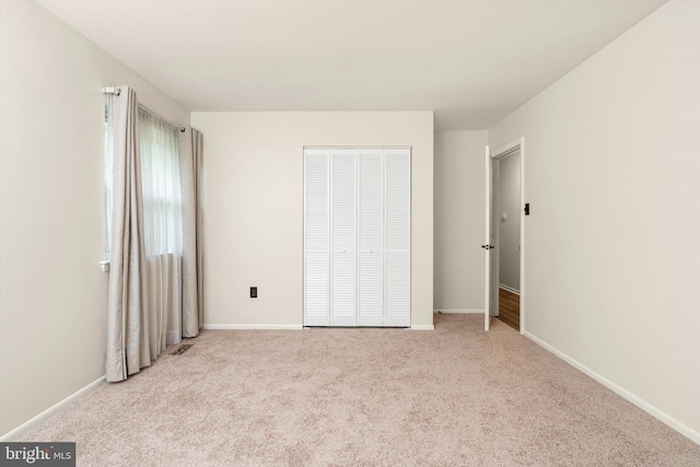 203 Coville Dr, Browns Mills, NJ 08015 - unfurnished bedroom with carpet floors, a closet, and baseboards