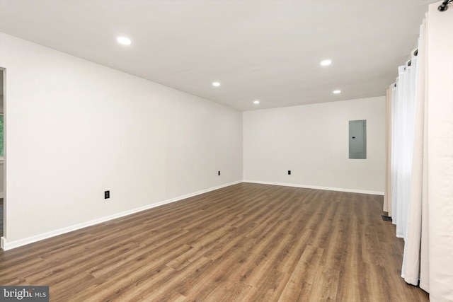 203 Coville Dr, Browns Mills, NJ 08015 - empty room featuring electric panel, wood finished floors, recessed lighting, and baseboards