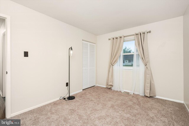 203 Coville Dr, Browns Mills, NJ 08015 - unfurnished room with carpet floors and baseboards