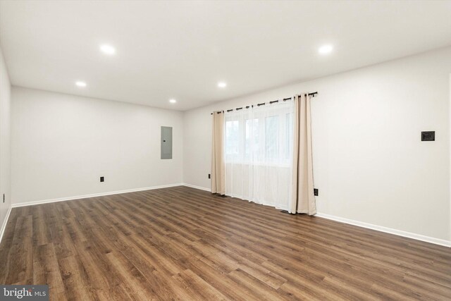 203 Coville Dr, Browns Mills, NJ 08015 - unfurnished room with recessed lighting, dark wood-type flooring, baseboards, and electric panel