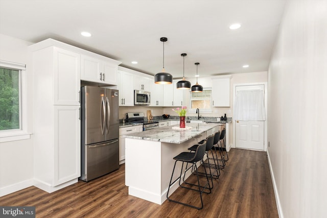 203 Coville Dr, Browns Mills, NJ 08015 - kitchen featuring appliances with stainless steel finishes, baseboards, white cabinets, dark wood finished floors, and recessed lighting