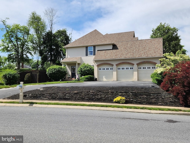 101 Heritage Rd, Lancaster, PA 17602 - view of front of home with driveway, a garage, and roof with shingles