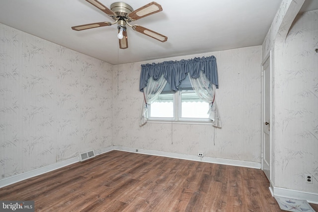 3311 Meridian St, Philadelphia, PA 19136 - spare room featuring wood finished floors, ceiling fan, and baseboards