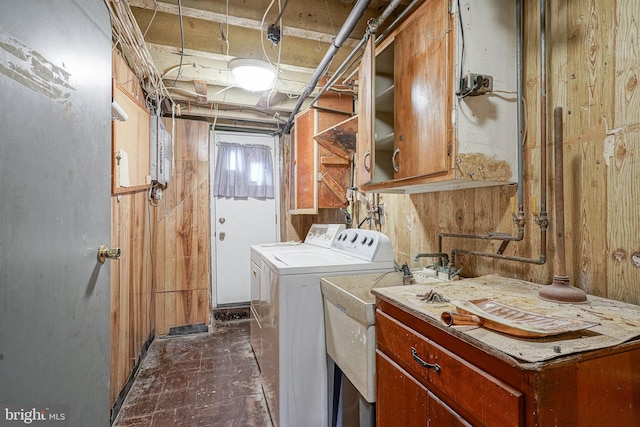 3311 Meridian St, Philadelphia, PA 19136 - laundry area with separate washer and dryer, cabinet space, and wooden walls