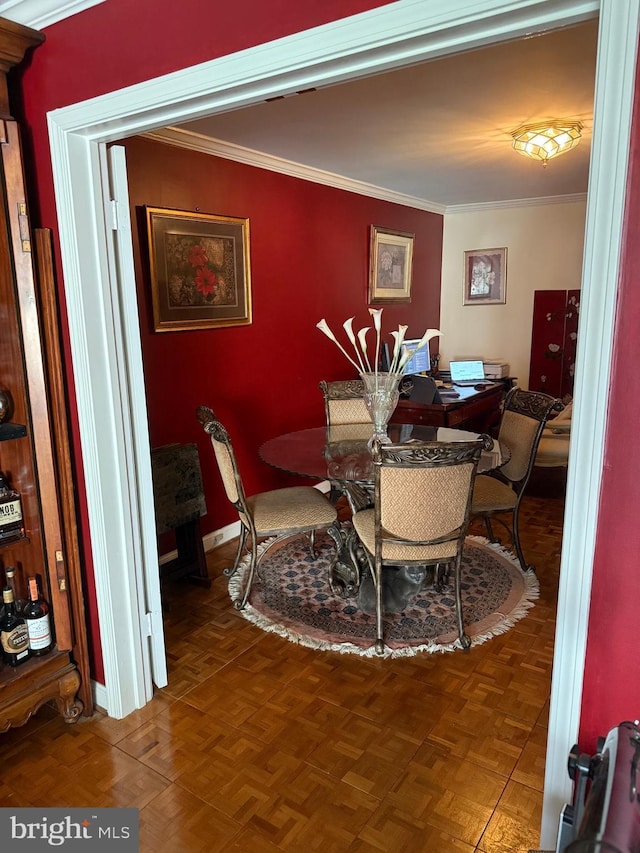 1250 S Washington St S Unit 207, Alexandria, VA 22314 - dining space featuring ornamental molding and baseboards
