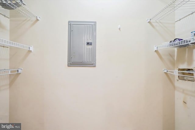 spacious closet featuring electric panel