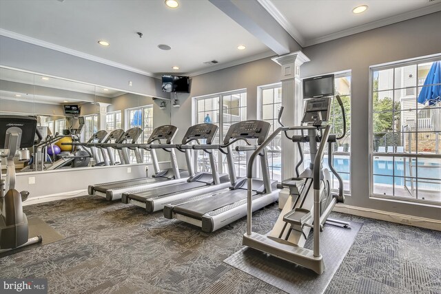 exercise room with carpet floors, recessed lighting, baseboards, crown molding, and decorative columns