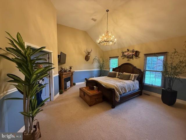 15920 River Bend Ct, Williamsport, MD 21795 - carpeted bedroom featuring a chandelier, a fireplace, lofted ceiling, and baseboards