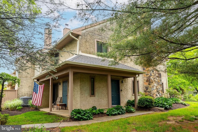 1644 Spring Mill Ct, Yardley, PA 19067 - view of side of property featuring stucco siding, a chimney, fence, central air condition unit, and a shingled roof