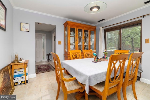 1644 Spring Mill Ct, Yardley, PA 19067 - dining area featuring light tile patterned floors, ornamental molding, and baseboards