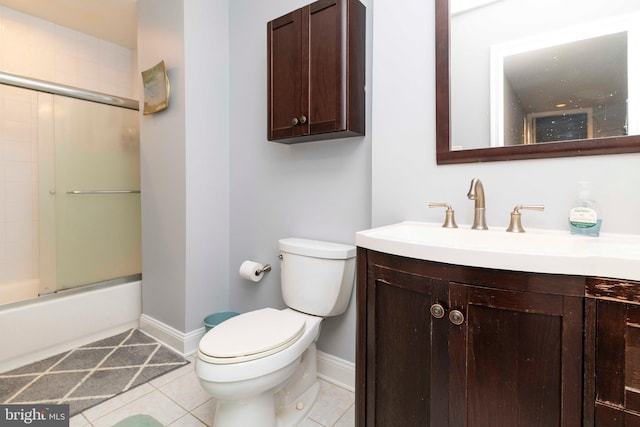 1644 Spring Mill Ct, Yardley, PA 19067 - full bathroom featuring toilet, vanity, tile patterned flooring, baseboards, and shower / bath combination with glass door